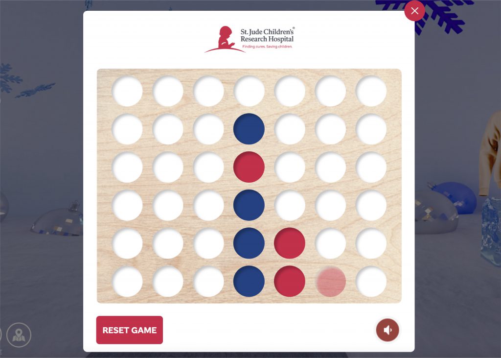 custom Connect 4 game in the St. Jude Winter Village for a gamification element